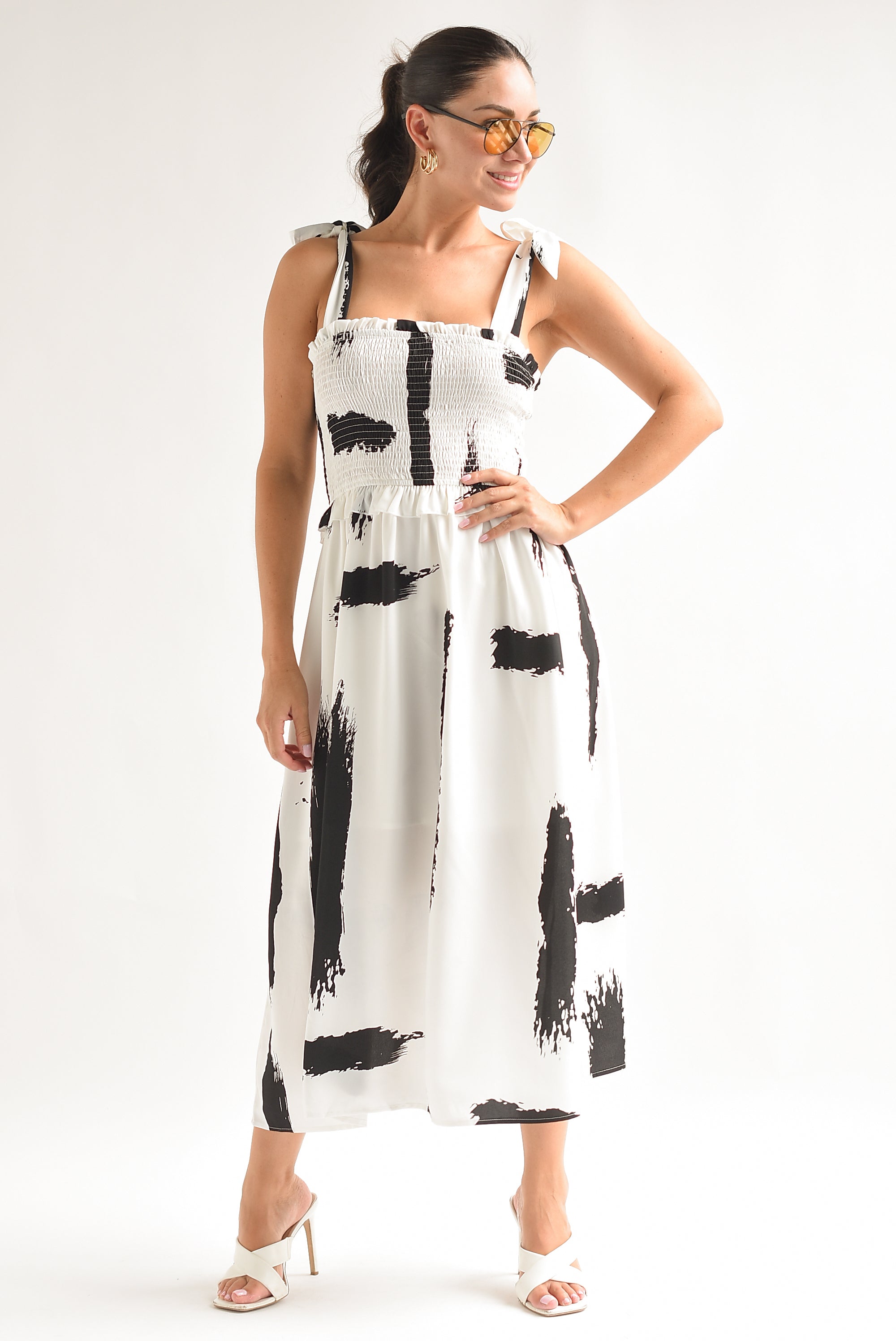 Vestido blanco y fashion negro midi