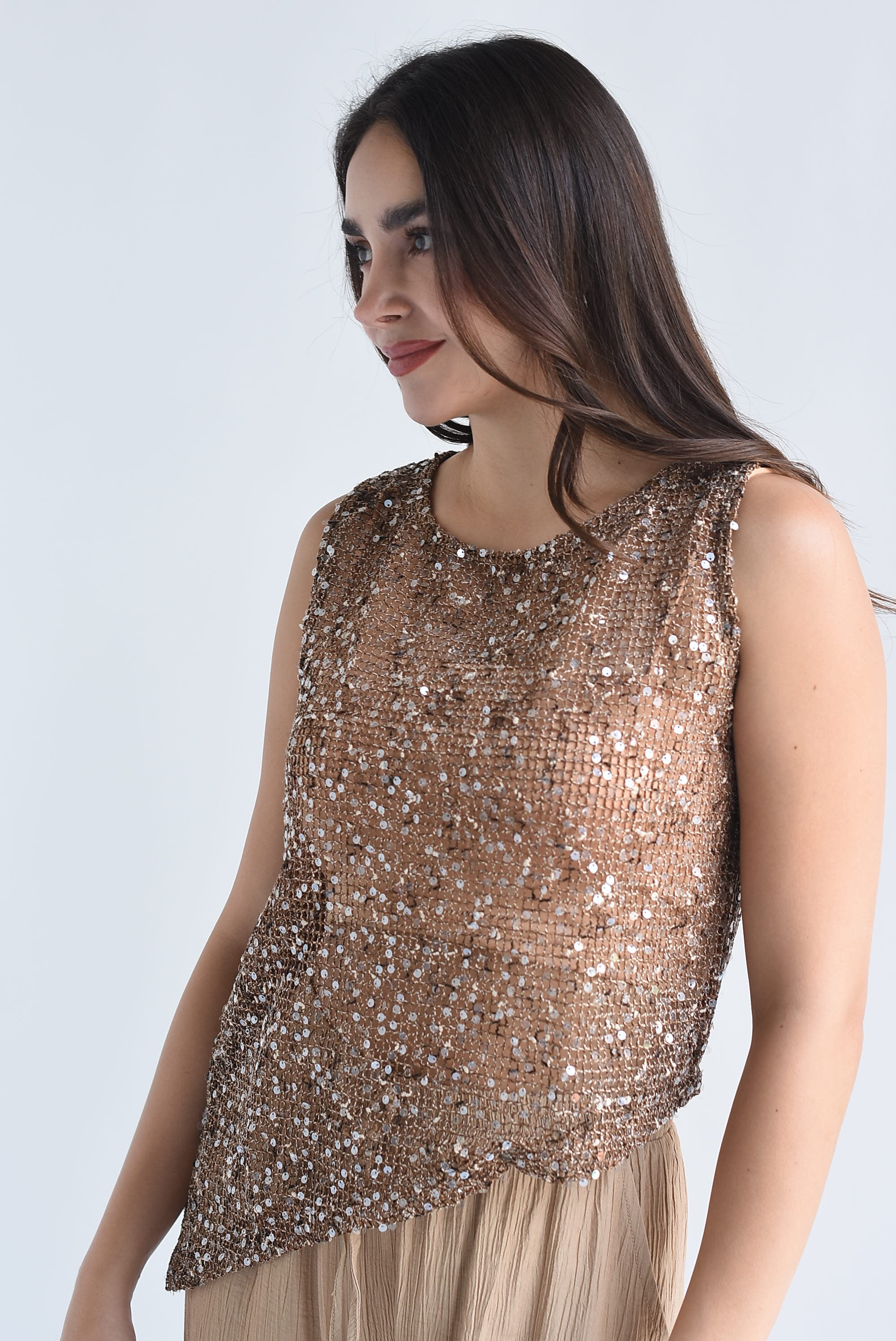 Blusa asimétrica fishnet lentejuela