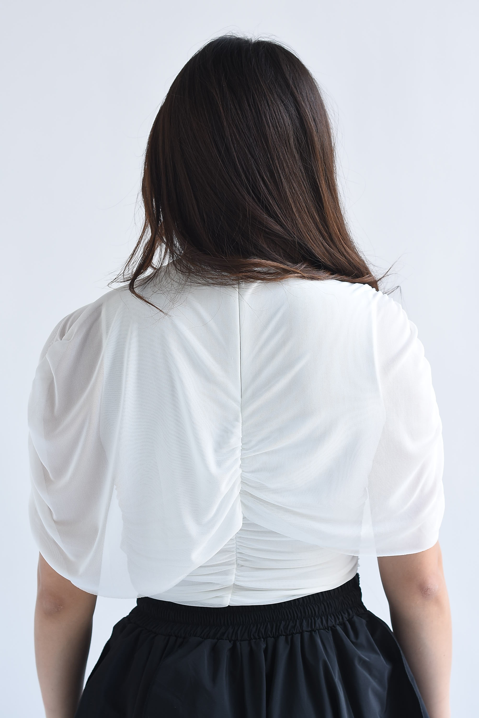 Blusa mesh capa drapeada cruzada