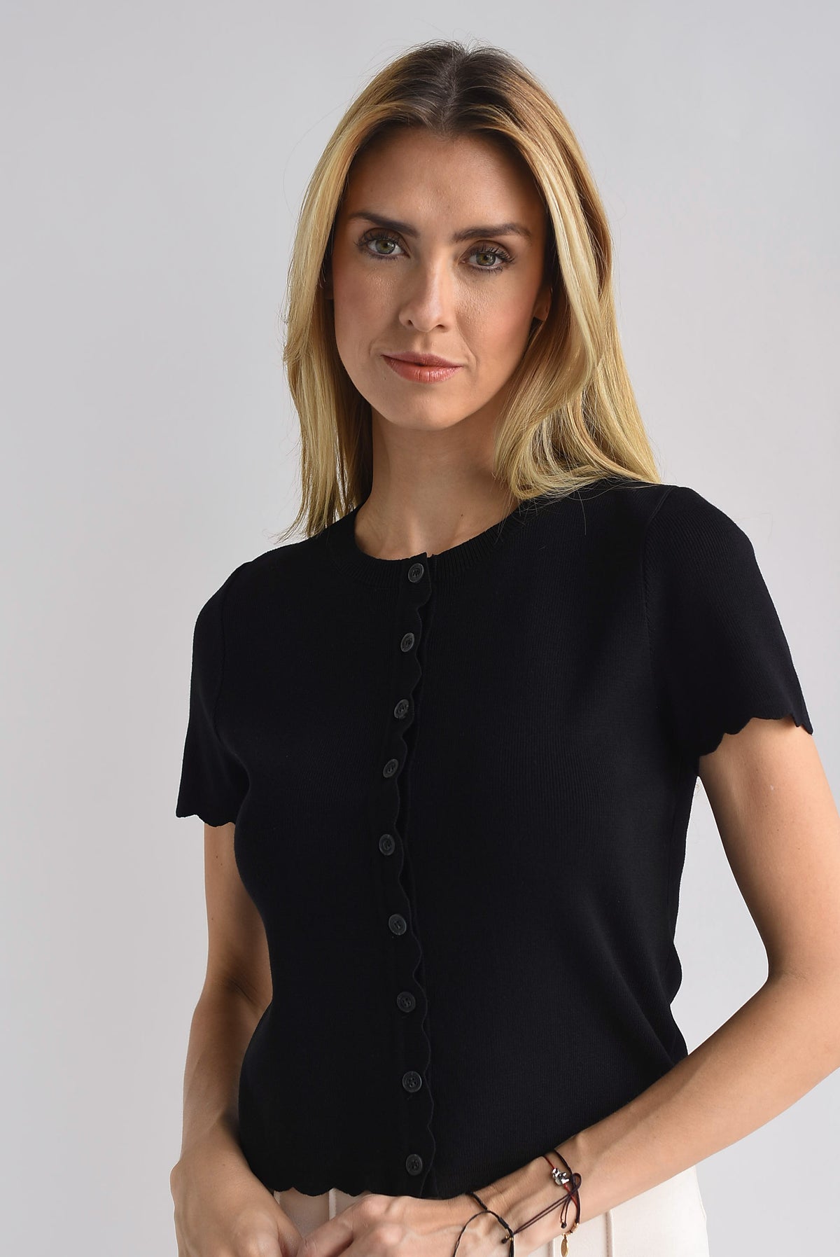 Blusa punto manga corta filo ondas