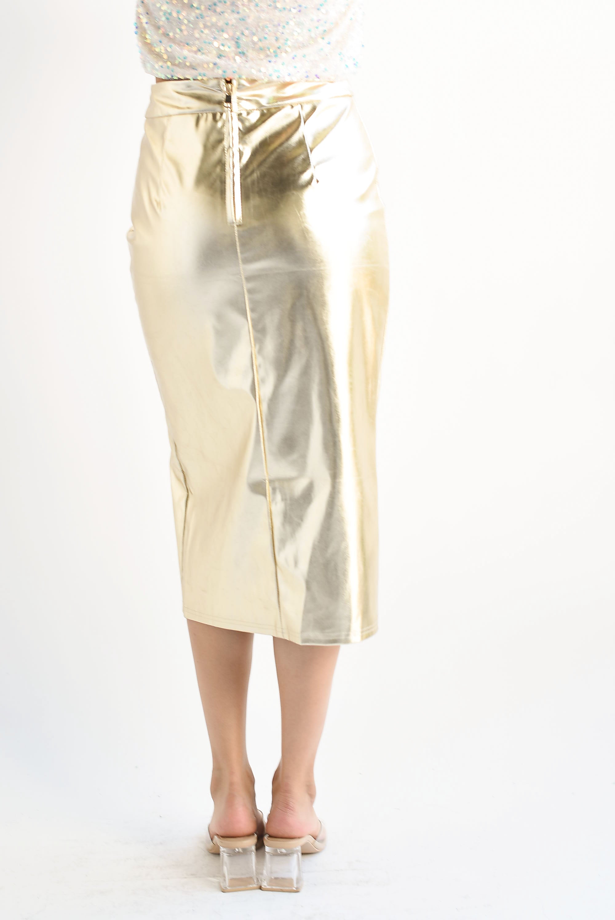 Falda lápiz abertura metálica Dorada