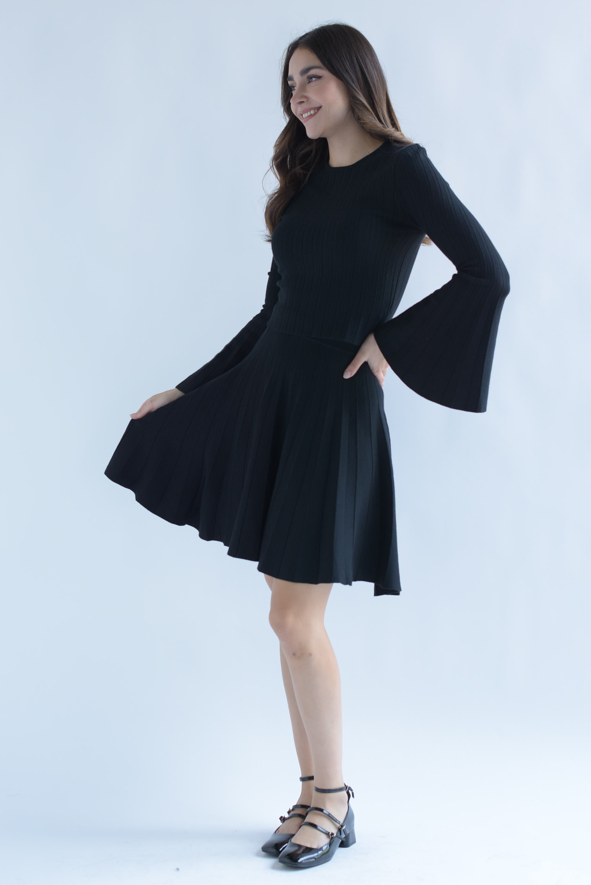 Set Falda plisada y Blusa manga trompeta punto Negro