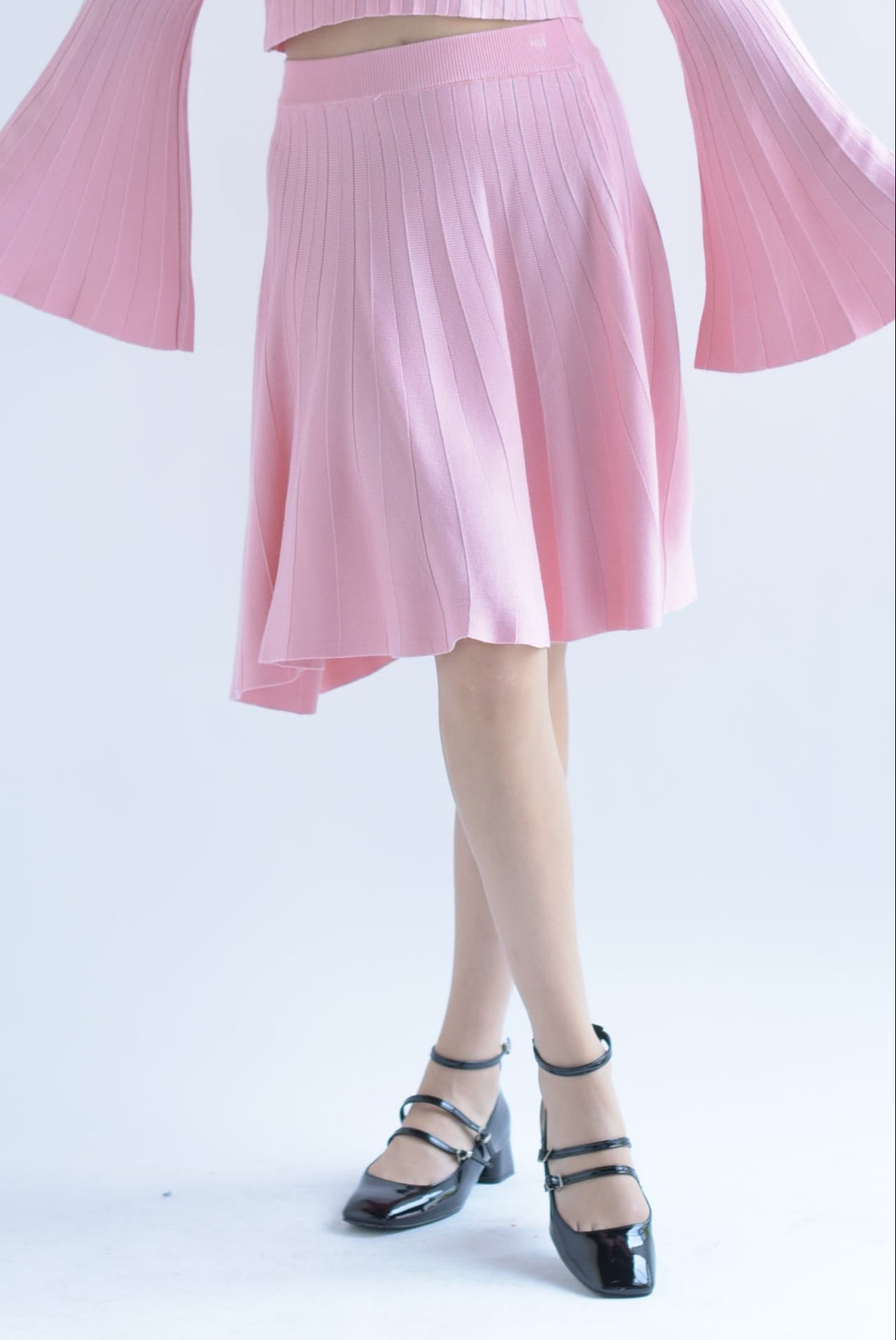 Falda plisada corte A punto Rosa