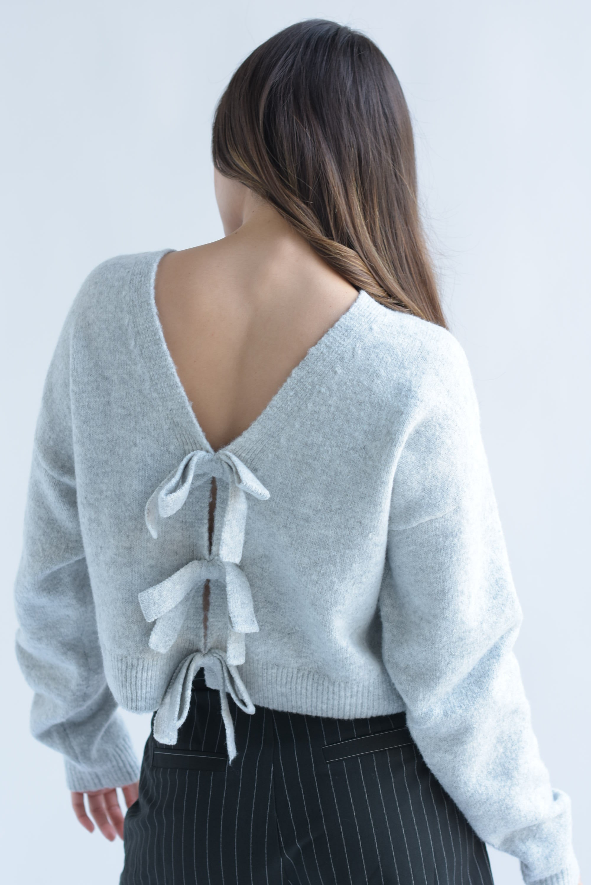 Sweater punto moños reversible Gris