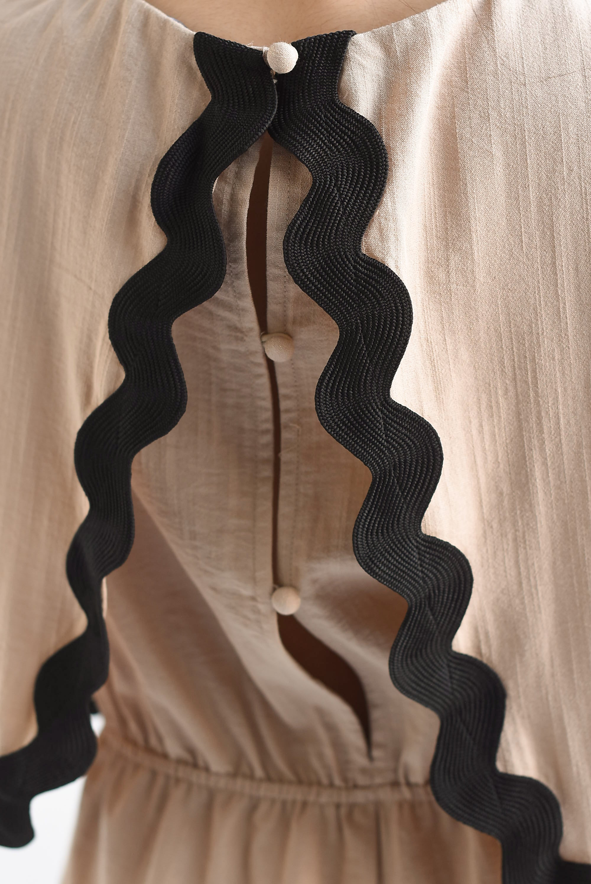 Romper bies ondulado Moka