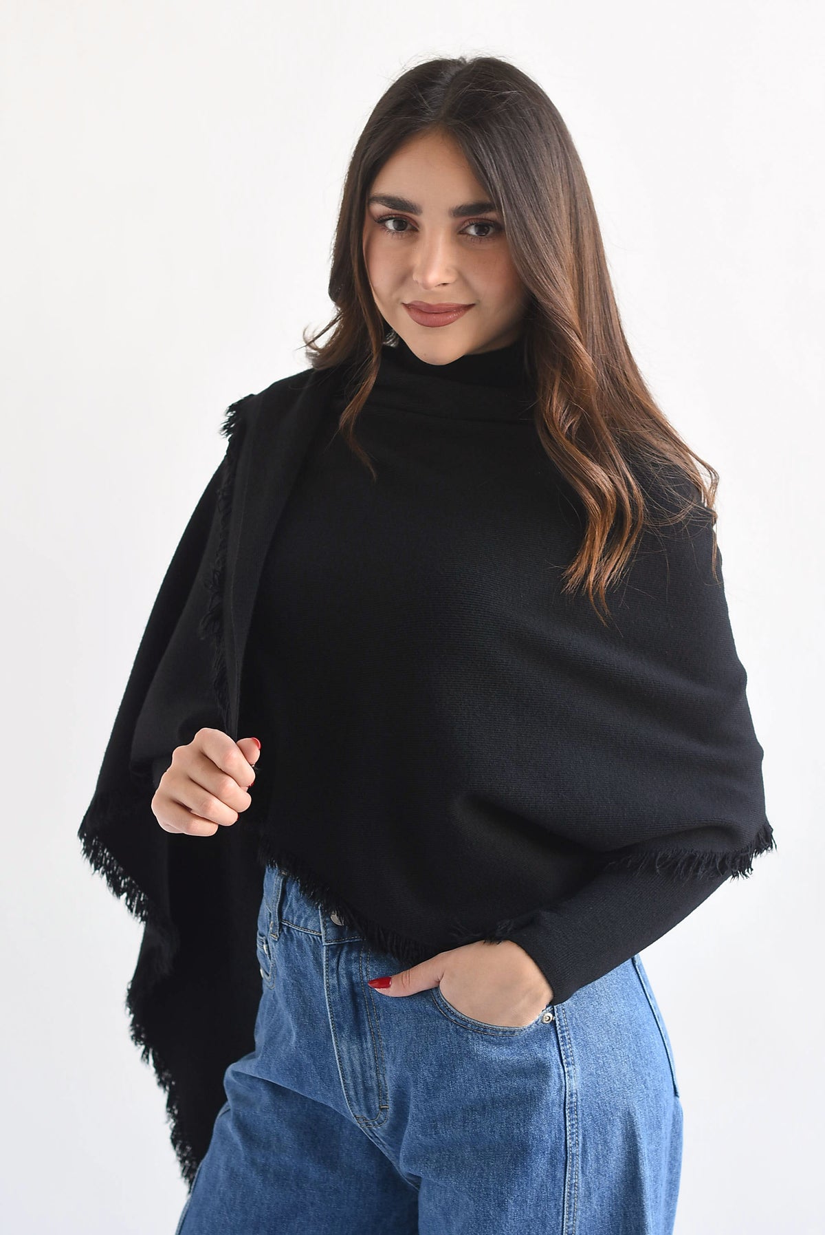 Sweater con capa