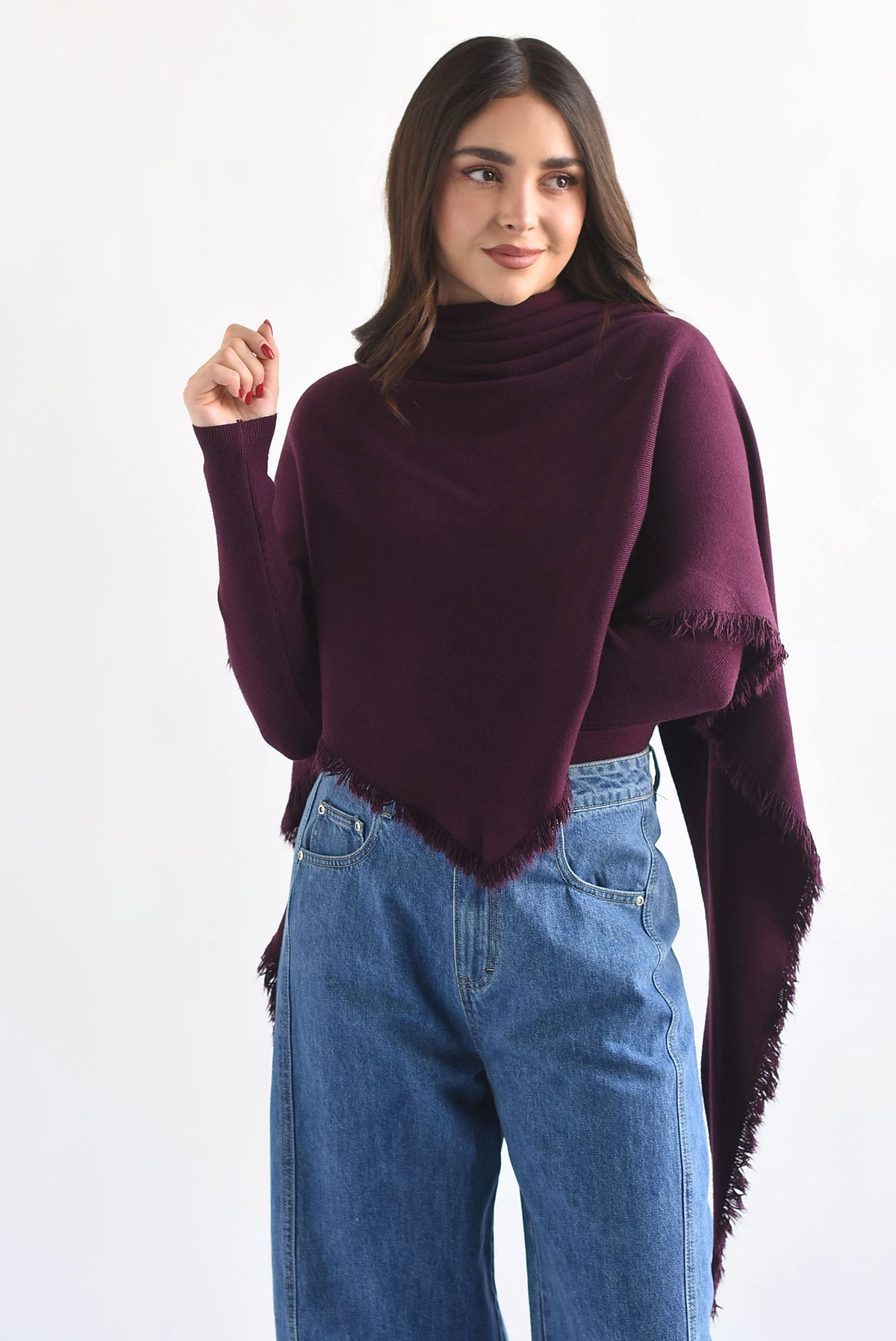Sweater con capa