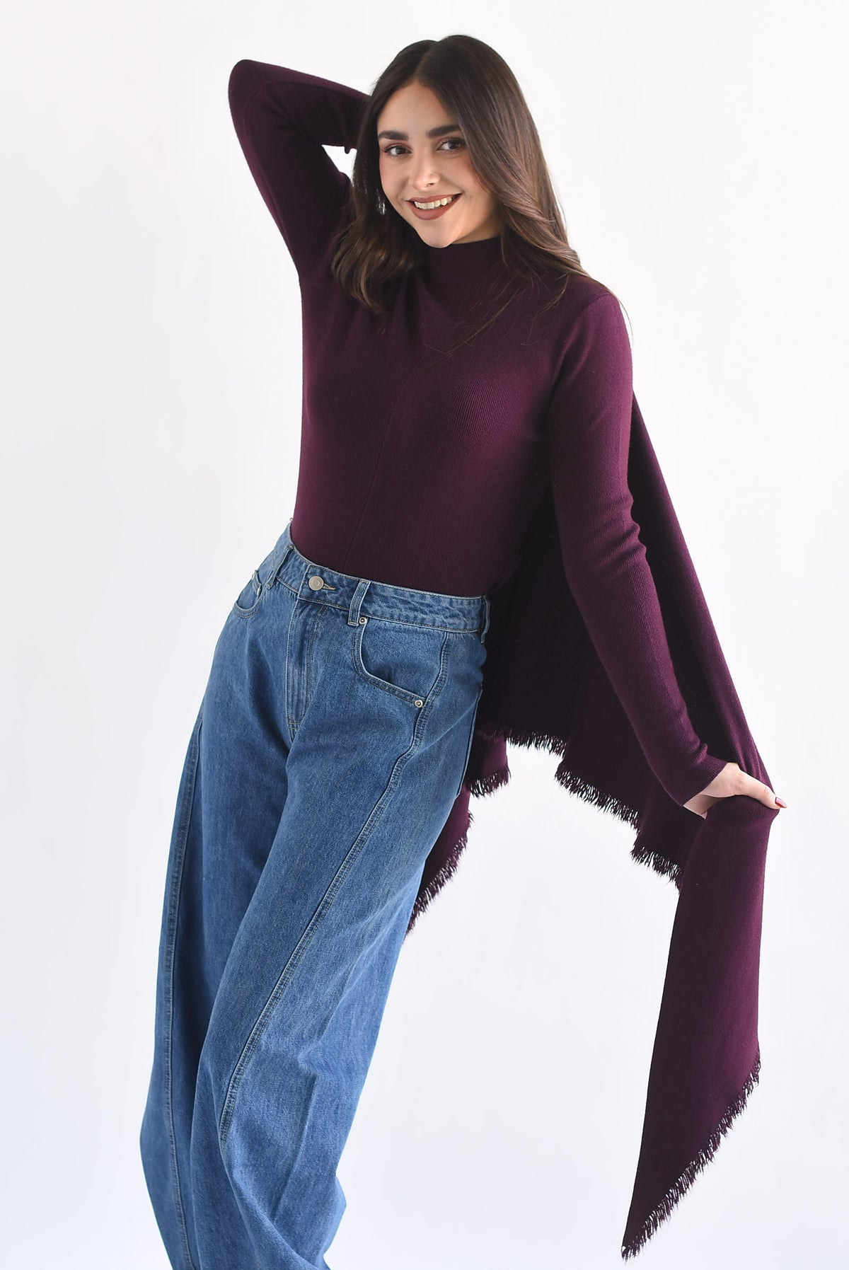 Sweater con capa