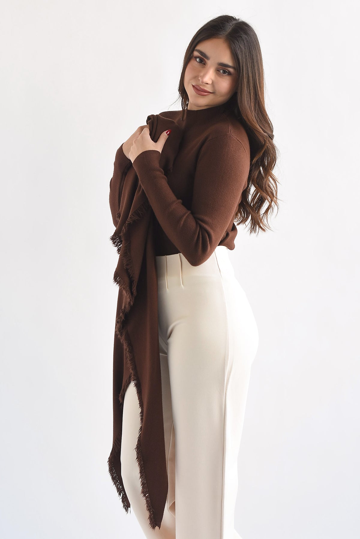 Sweater con capa