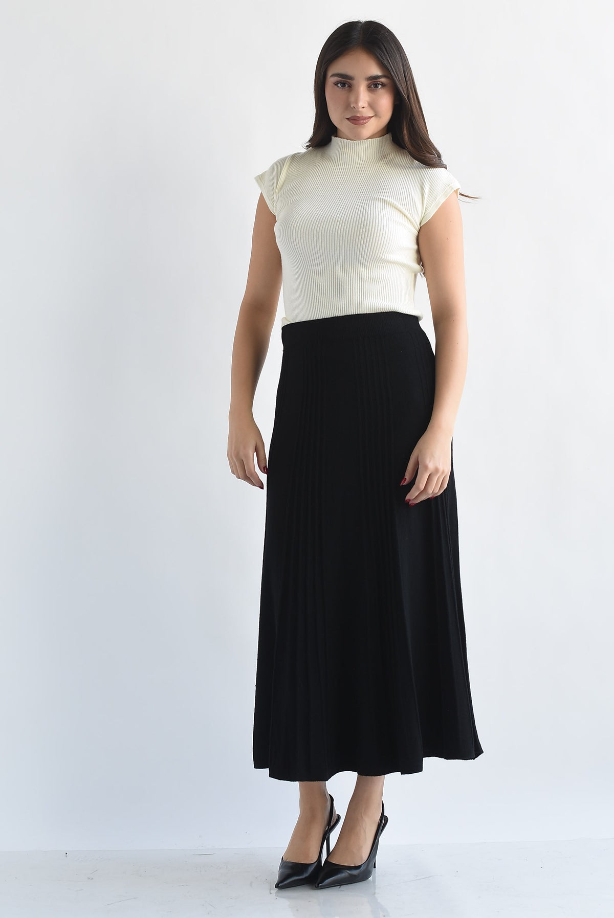 Falda midi punto plisada