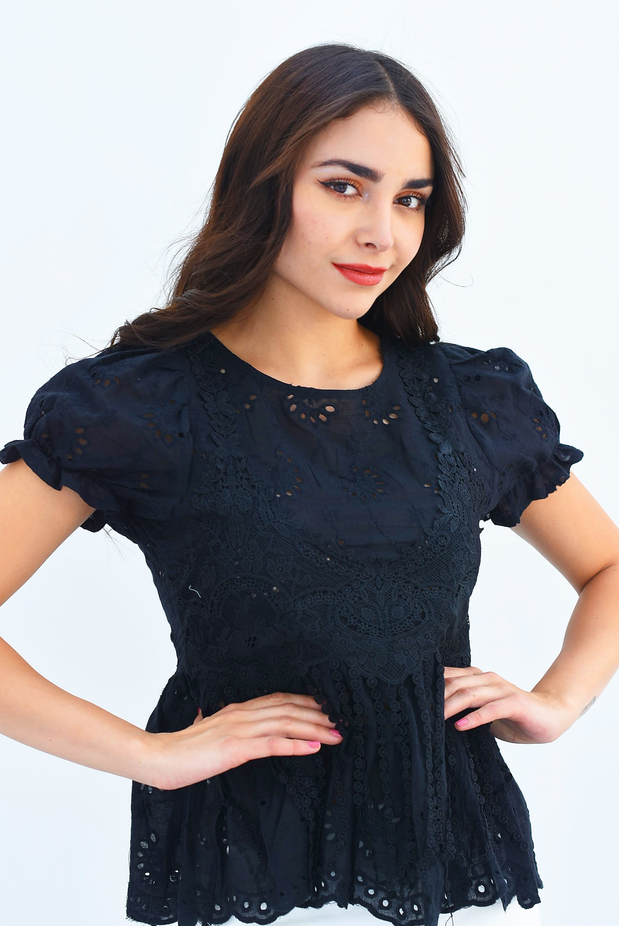 Blusa peplum calada Negra