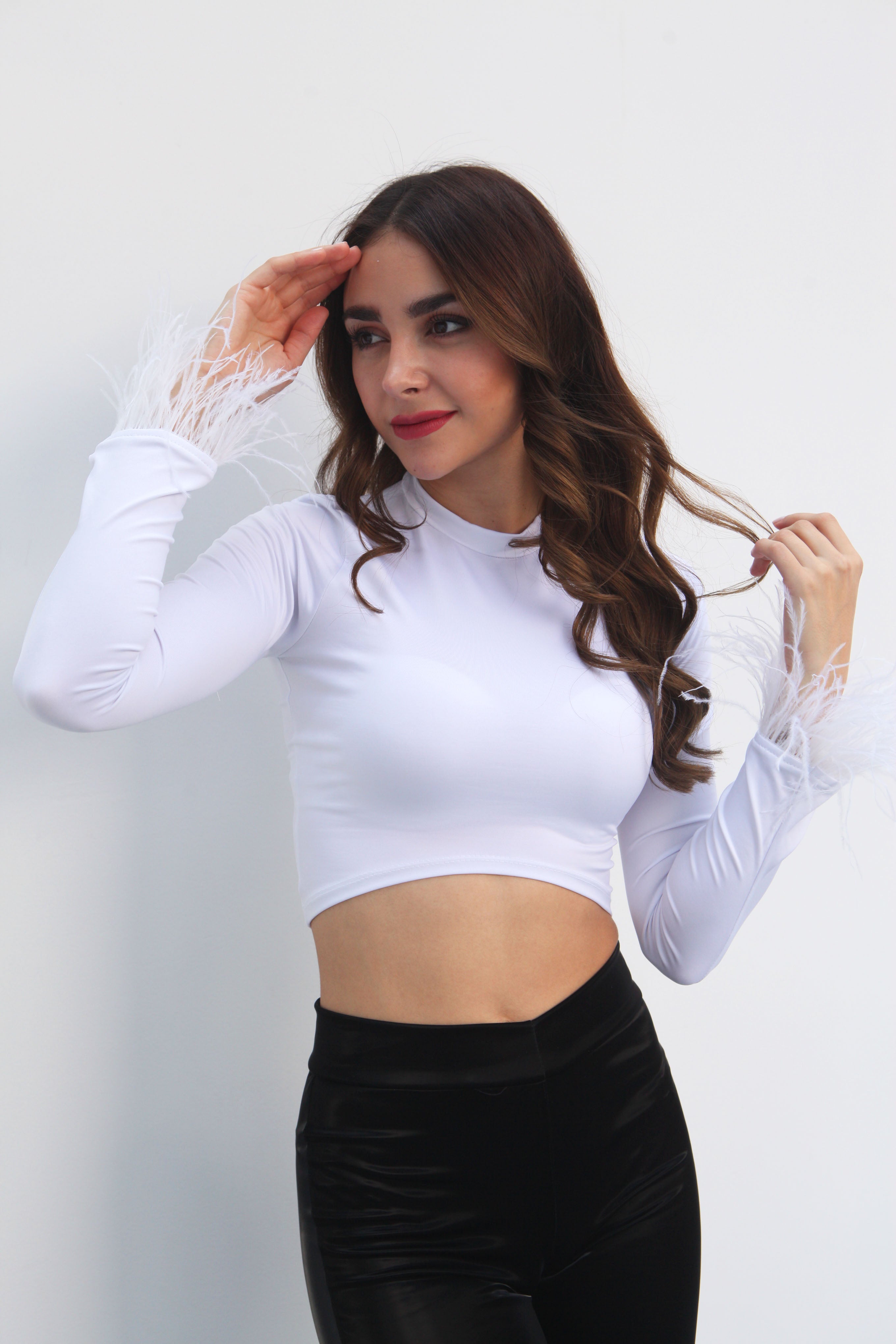 Top manga larga plumas Blanco