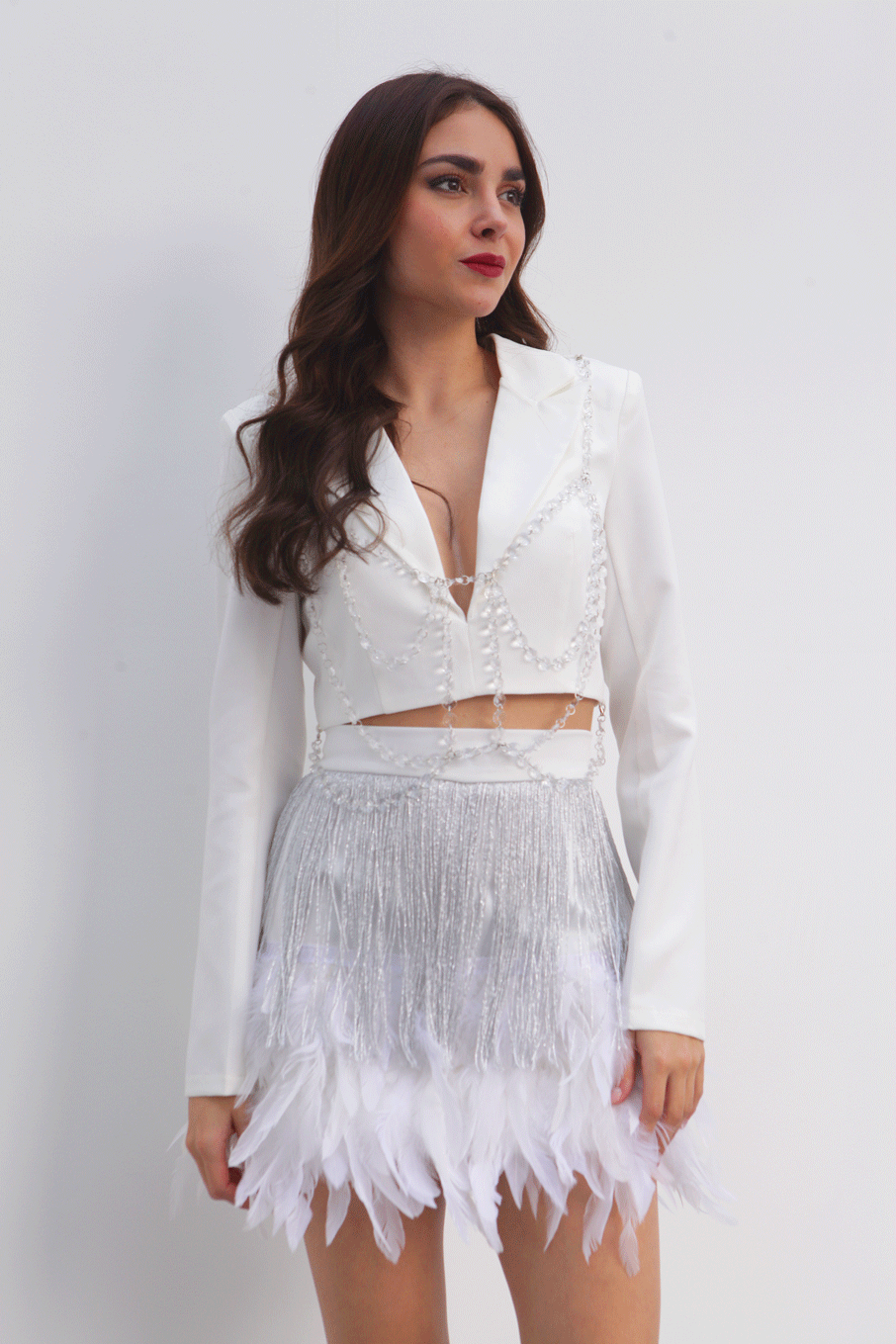 Mini falda con flecos y plumas Blanca – Fashion