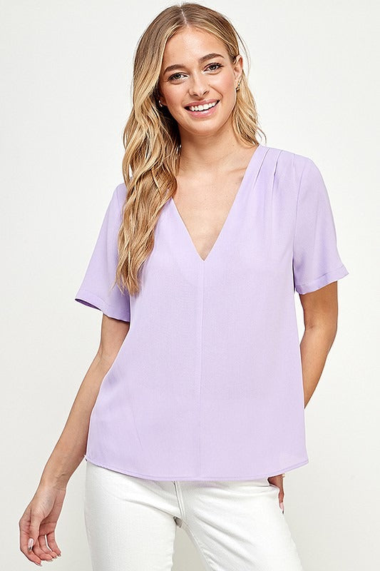 Blusa cuello V drapeado hombros Lila
